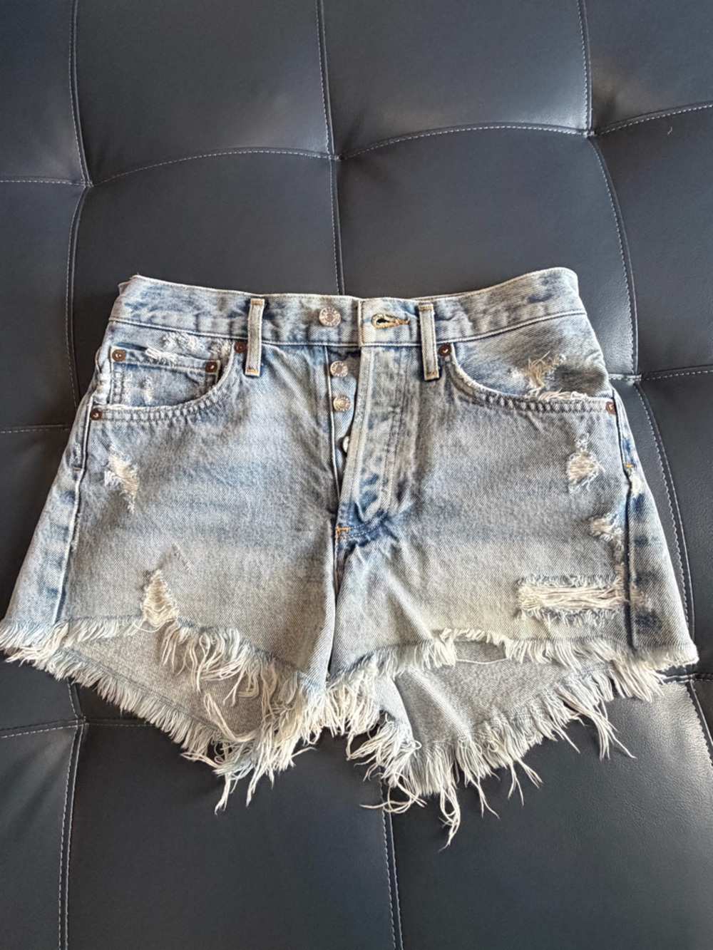 Agolde Light Blue Distressed Denim Shorts with Frayed Hem